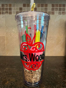 Large acrylic tumbler filled with pens, pencils, scissors, white board marker, eraser, post it!